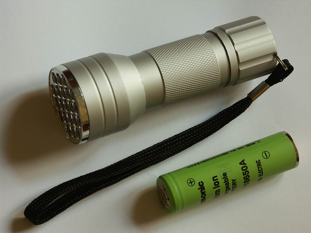 Cheap 21 LED flashlight for 3 AAA cells, modded for use with single 18650 Li-Ion cell