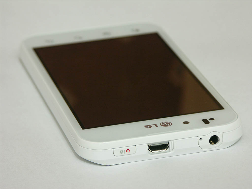 LG P970 top view showing power button, USB port, and headphone jack