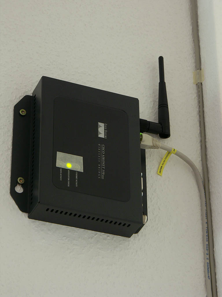 Finally my Wireless LAN access point got a decent place on the wall - the USB extension cable next to it runs to my surveillance-webcam on the roof