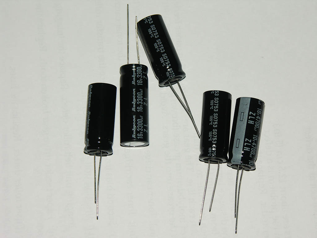 New low-ESR capacitors  for my Tagan 480W. Finally figured out that the aged caps are the cause for this unbearable squeeking. Now its gone and everyt...